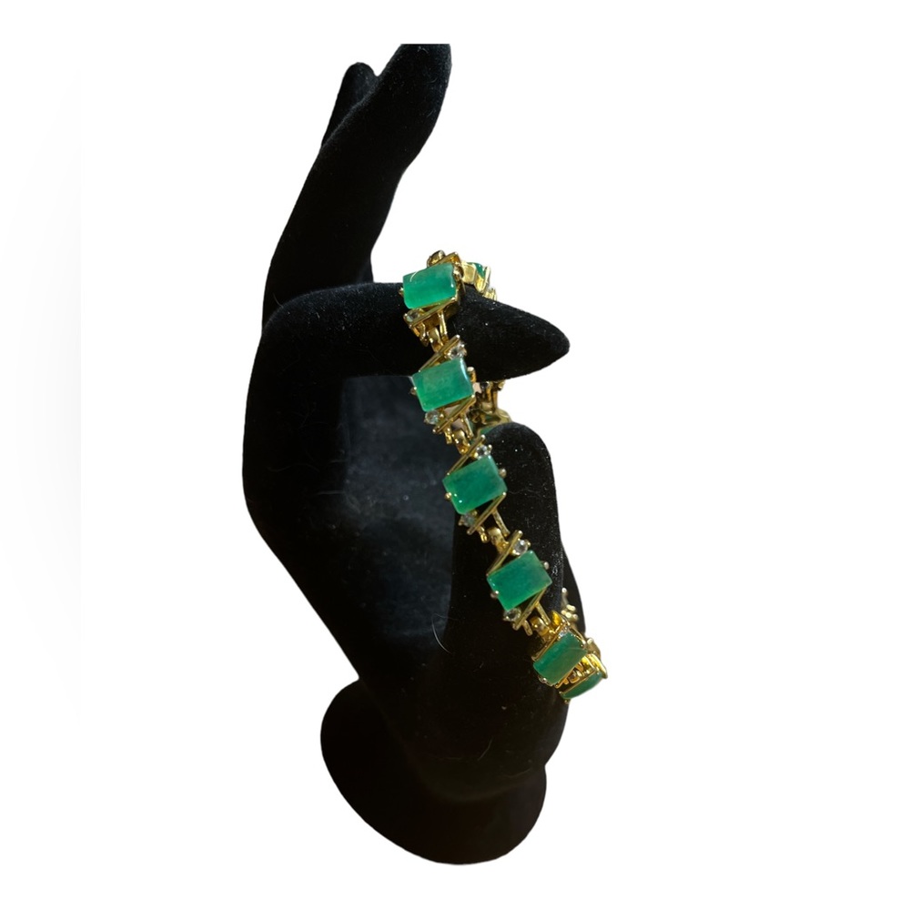 Gold Tone Bracelet with Green Settings